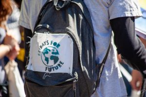 Backpack with Fridays for the Future slogan