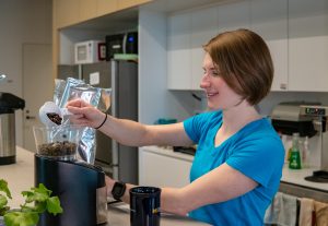 staff in an office kitchen with sustainable features