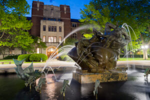 The exterior of the Michigan League featuring a fountain.