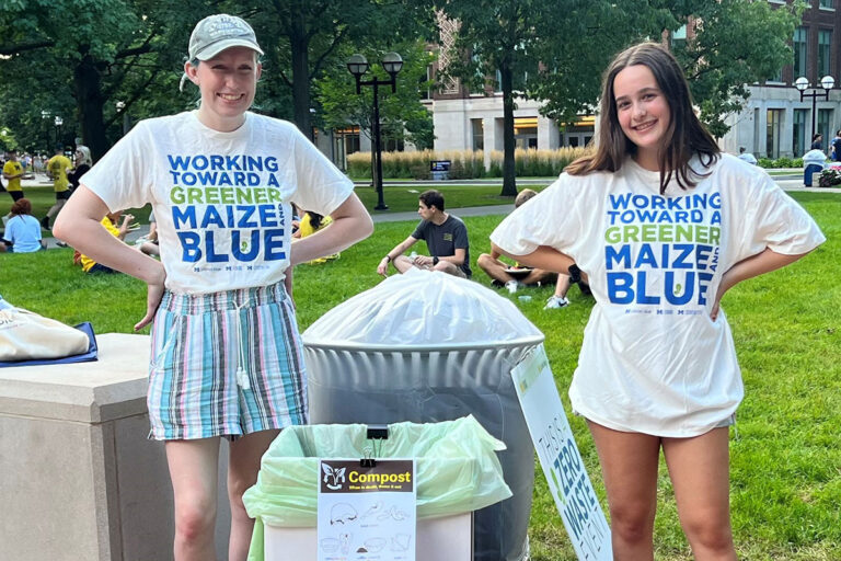 Students monitoring zero-waste bins