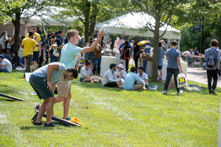 Michigan students playing cornhole
